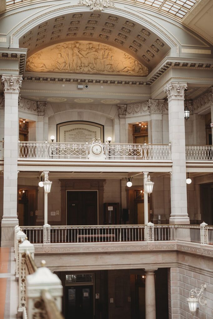 Couple posing at historic Hartford City Hall Wedding