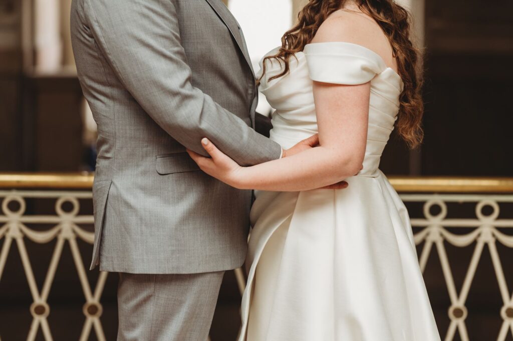 Bride and groom posing for wedding photography at historic Hartford City Hall