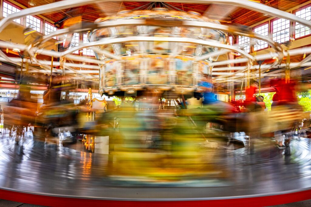 a spinning blurry carousel at lighthouse point park
