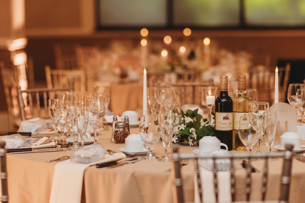 A beautiful table setting with wine and candles.