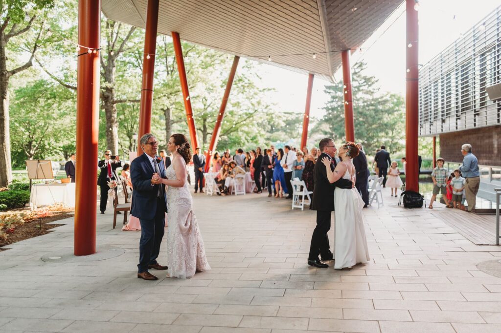 father daughter dance under the terrace at Queens Botanical Garden